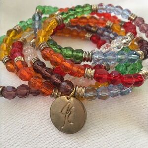 John Edwards EVOLVE glass beads stretch bracelets. New in Box!